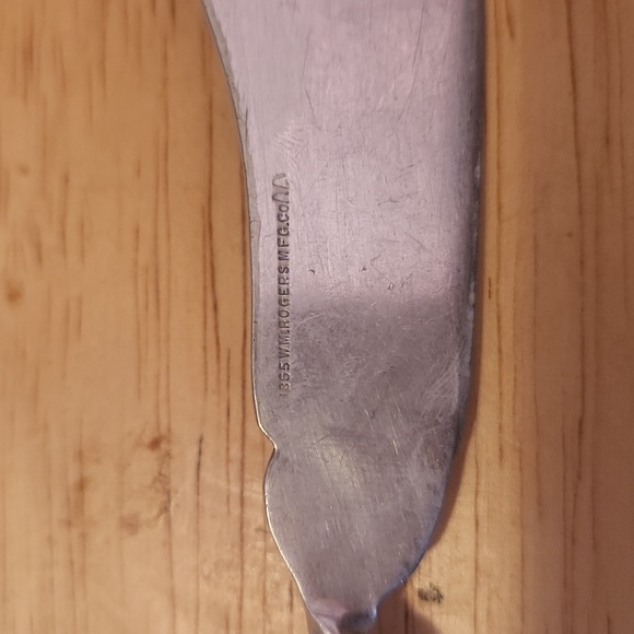 Vintage WM Rogers butter knife with twisted handle. - Picture 6 of 8